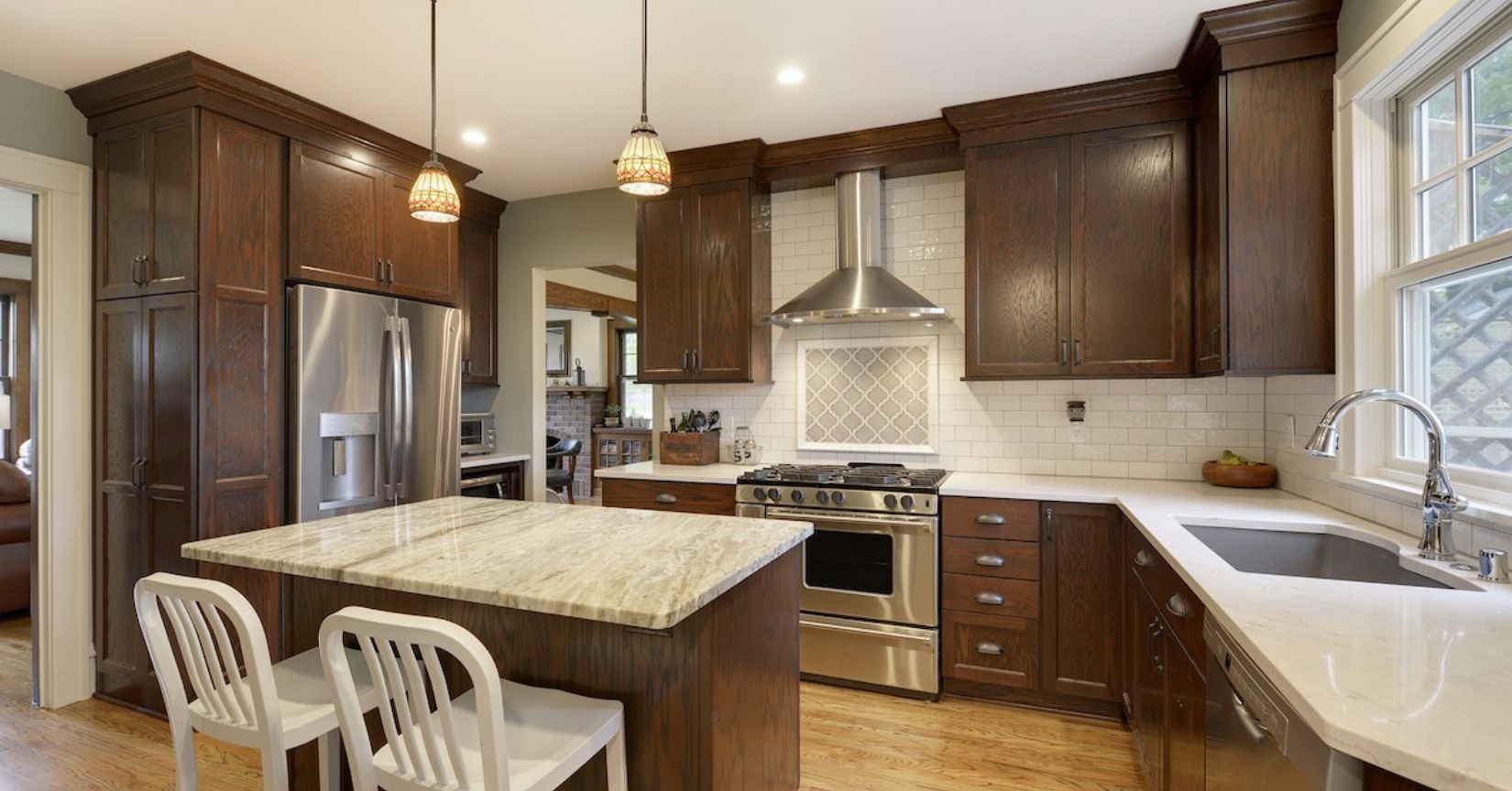 Cherry Cabinets with White Countertops: Spacious Kitchen Magic